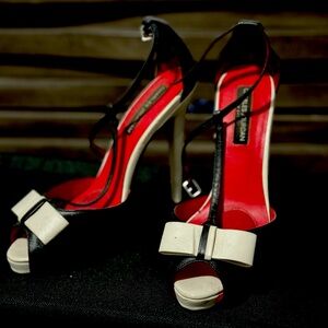 Charles Jourdan slightly worn black and white heels with bow